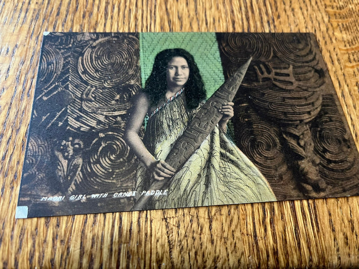 Maori Girl with canoe paddle