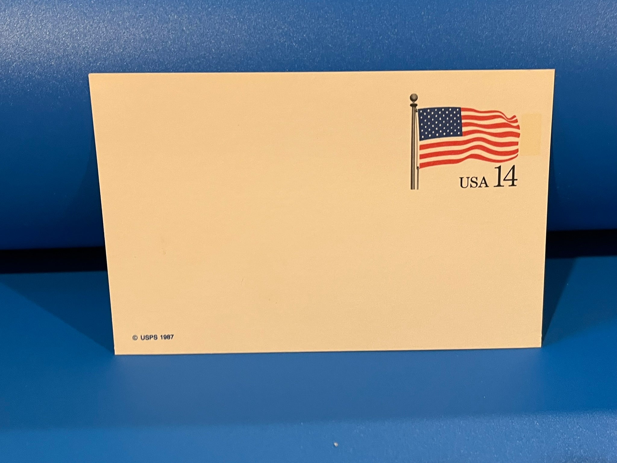 1987 American Flag postcard. (Unuied) – History Bound